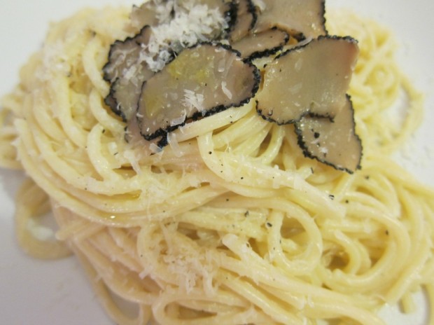 Simple pasta with decadent truffles makes for a perfect pairing. Photo via 